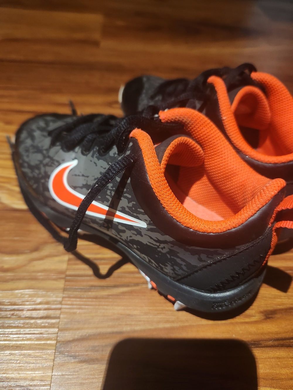 Nike Kids Black and Orange Athletic Cleats